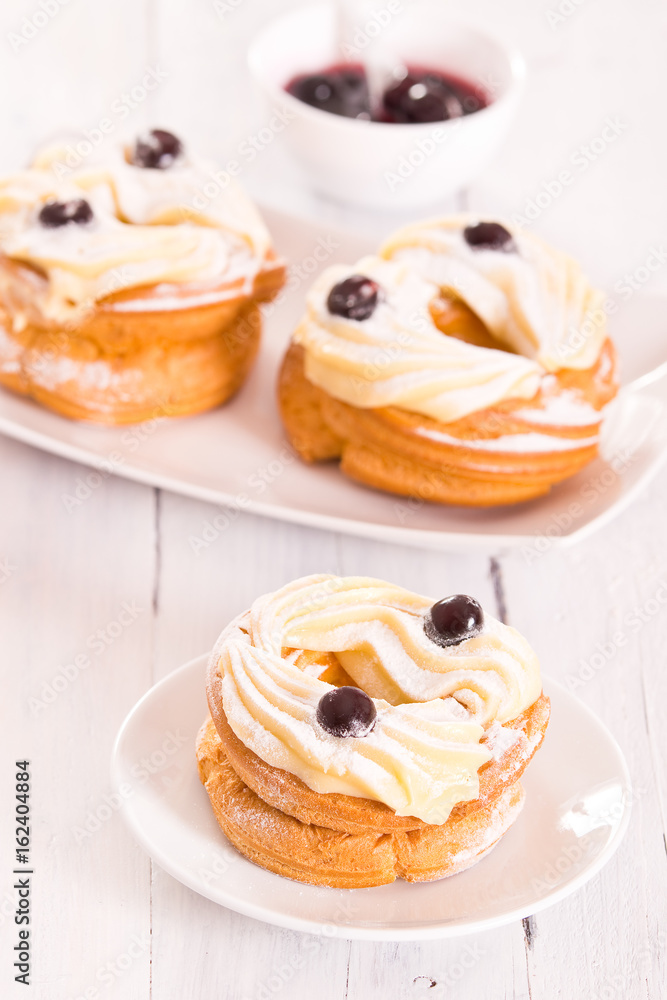 Zeppole with pastry cream. Zeppole with pastry cream.