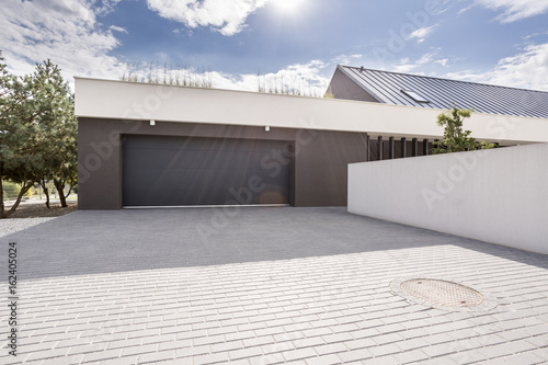 Modern garage with big driveway photo