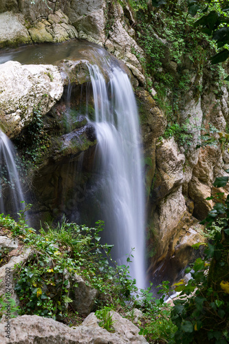 Waterfall in green subtropical mountains