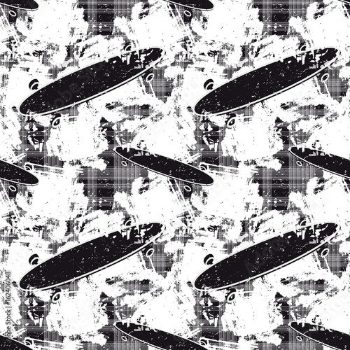 Grunge seamless pattern with skateboards. Vector