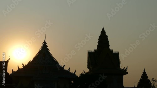 Sunset at the Wat Ounalom in Phnom Penh Cambodia photo