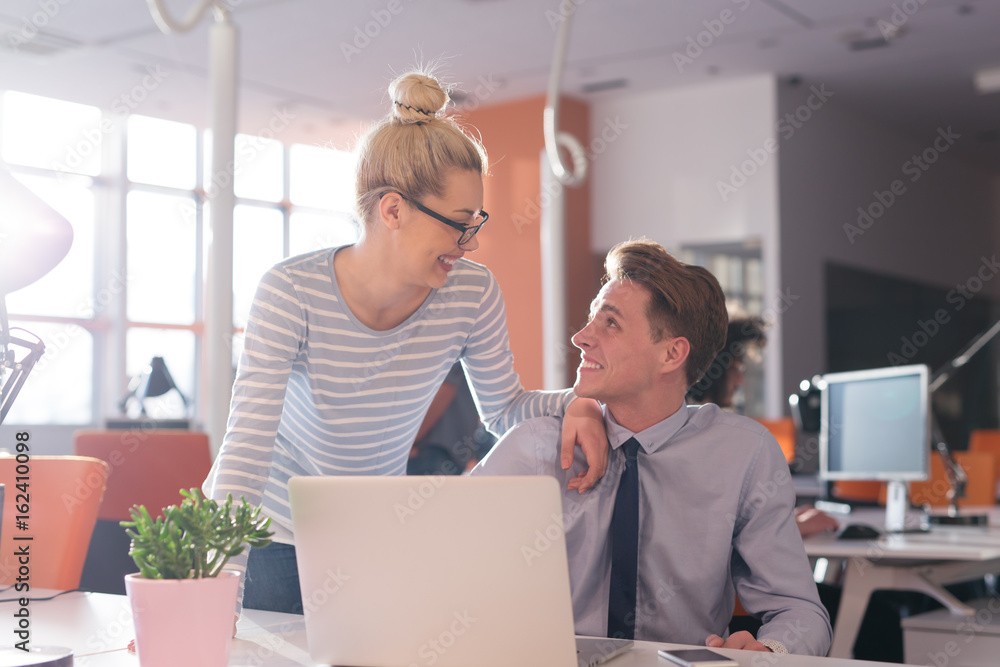Two Business People Working With laptop in office Two Business People Working With laptop in office