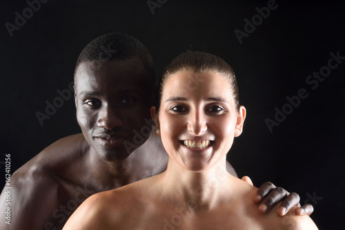 Portrait of a couple on black background