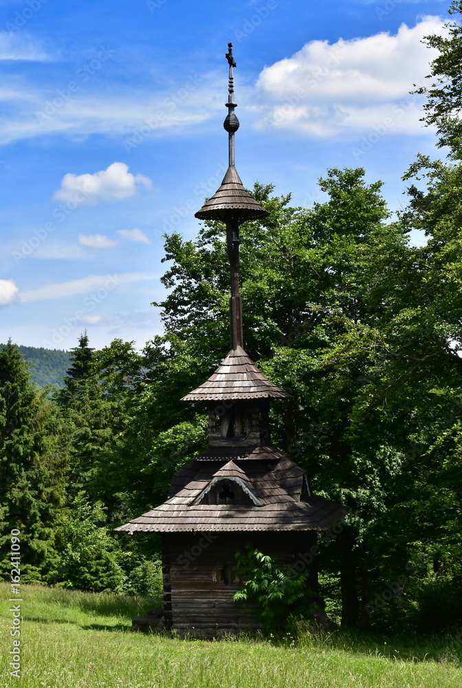 wooden bell tower on top hill Radhost,Beskydy,Czech republic wooden bell tower on top hill Radhost,Beskydy,Czech republic
