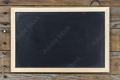 Space chalkboard background texture with wooden frame with space to write. blackboard space for wallpaper. Landscape mounting style horizontal. 
