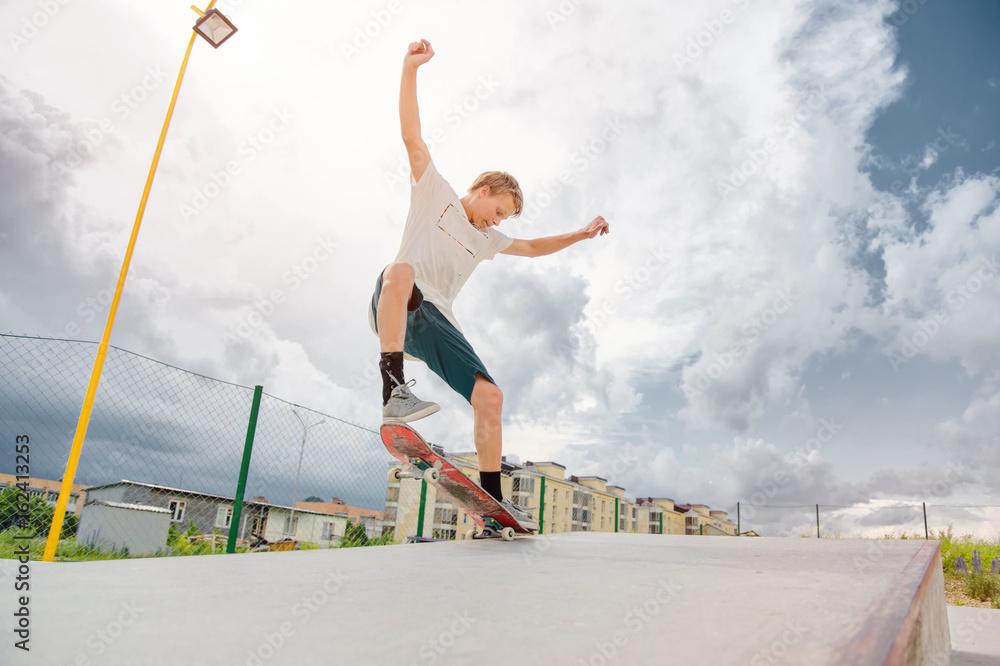 The boy catches the balance in the manual and slip