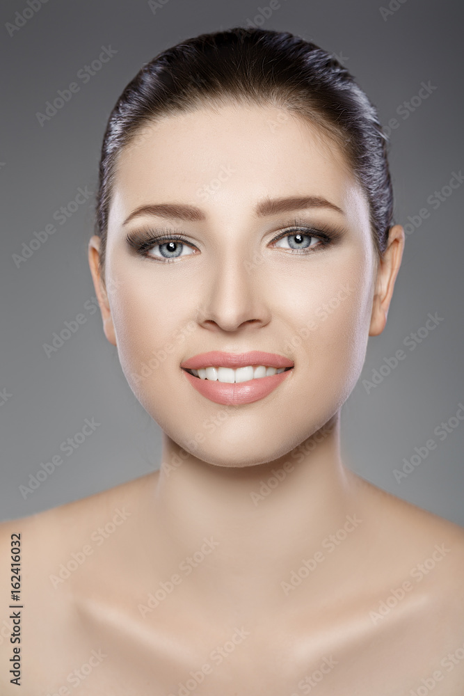 beautiful woman's face with blue eyes and clean fresh skin. Spa portrait beautiful woman's face with blue eyes and clean fresh skin. Spa portrait