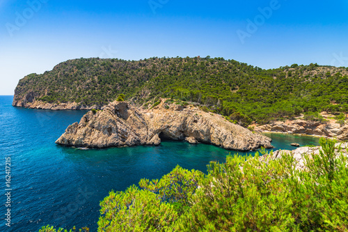 Idyllic island scenery, beautiful seaside bay of Cala des Monjo, Majorca Spain photo