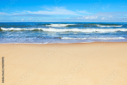 Beautiful sea and sandy beach on a Sunny summer day. Copy space