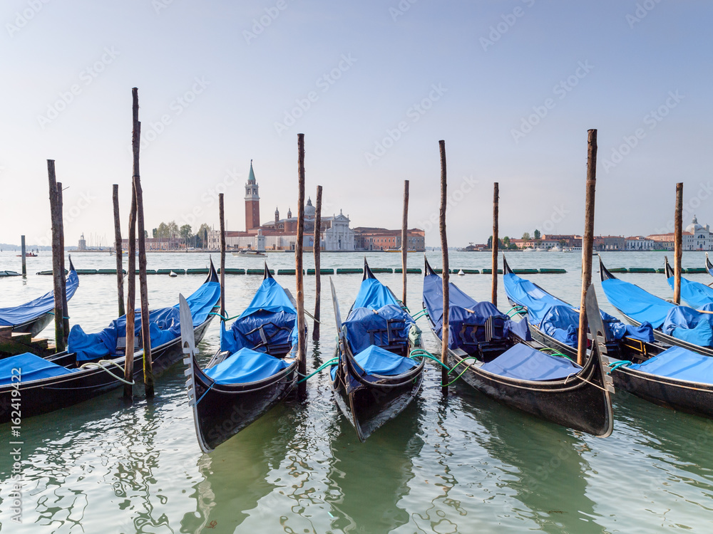 Gondolas moored on the Grand Canal near Piazza San Marco Venice