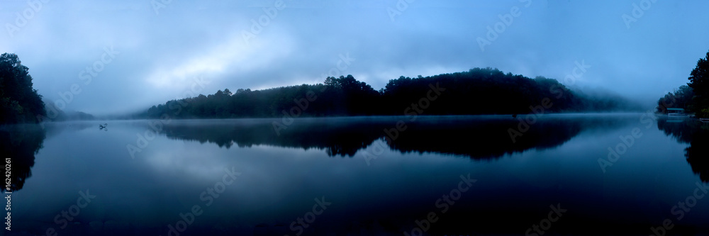 dark blue lagoon with mist panoramic