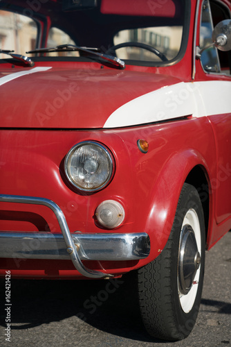 Small classic car in the streets of Lipari, Italy