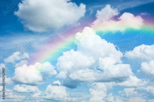 beautiful classic rainbow across in the blue sky after the rain © rakop_ton