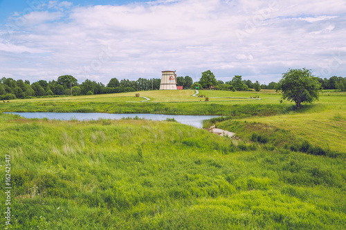 Lake with old Mills  in Dunte, Latvia. Baron Munchausen museum. 2017 photo