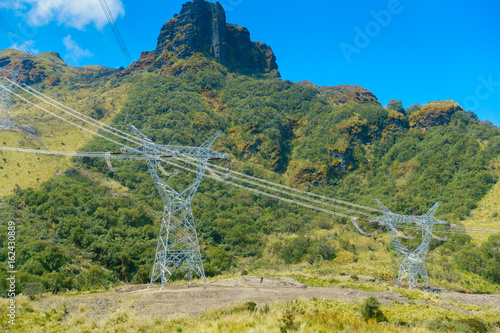 Beautiful landscape of Papallacta mountains in a sunny day with electrict towers in Quito Ecuador