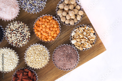Various superfoods, seeds, cereals, grains on a  white background. Healthy eating concept. Flatlay