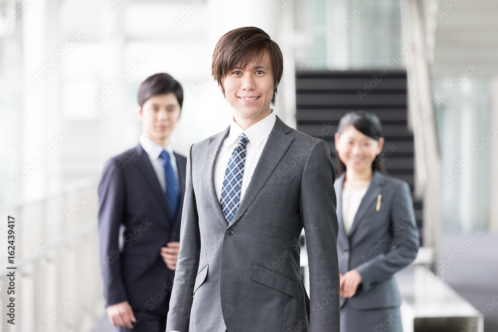 portrait of young businessgroup in office portrait of young businessgroup in office