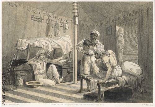British officers relax in their tent in India  1860. Date: 1860