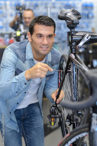 man working in bike workshop