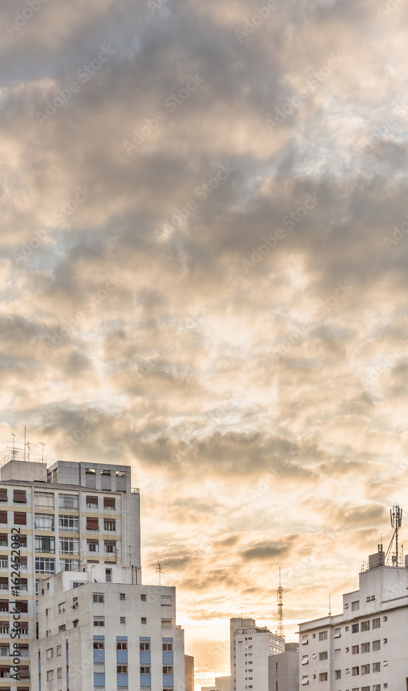 buildings and cloudy sky, urban sunset, sao paulo