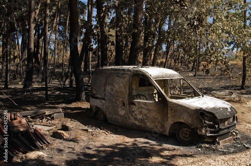 Small van burnt to the ground at a small village of Pedrogao Grande municipality photo