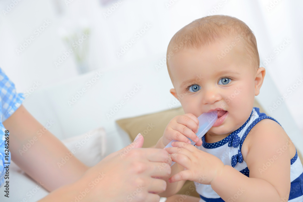 baby feeding spoon of porridge baby feeding spoon of porridge