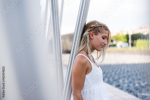 happy beautiful blonde woman smiling looking at the camera and posing Free Download happy beautiful blonde woman smiling looking at the camera and posing - GFXLoad