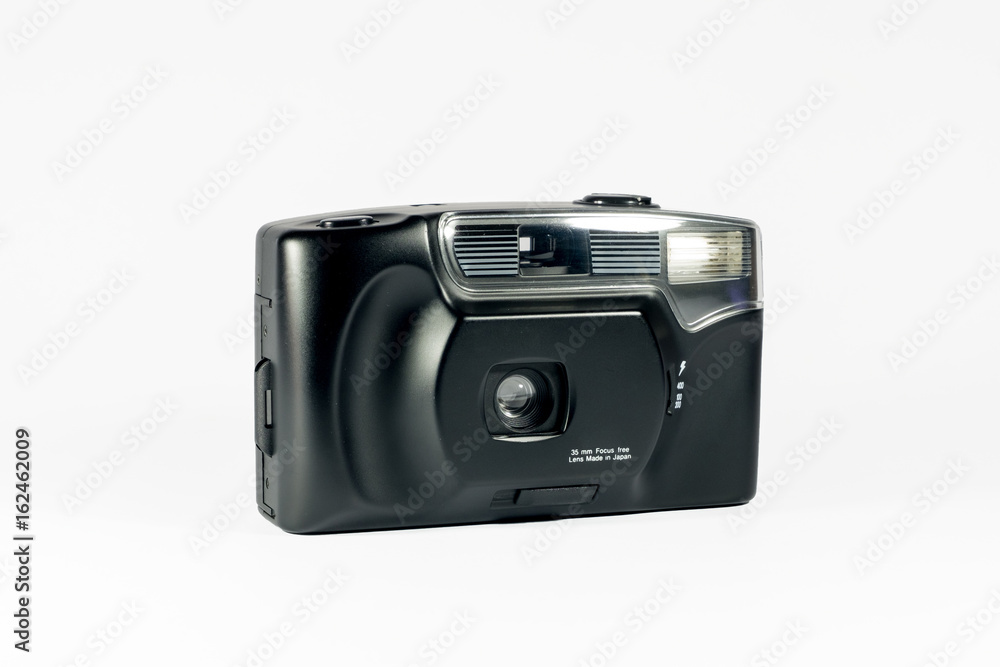 Compact 35mm film camera on white background Compact 35mm film camera on white background