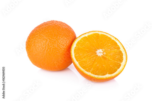 whole and half cut navel orange on white background