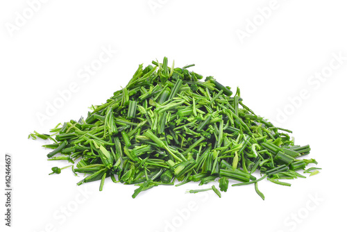 pile of slice green senegalia pennata leaf or or cha om isolated on white background