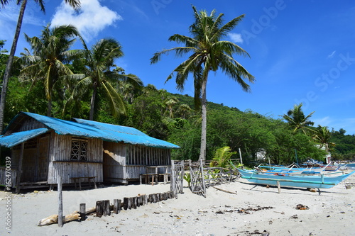 Boat and fisherman's house in the sea.selective focus.