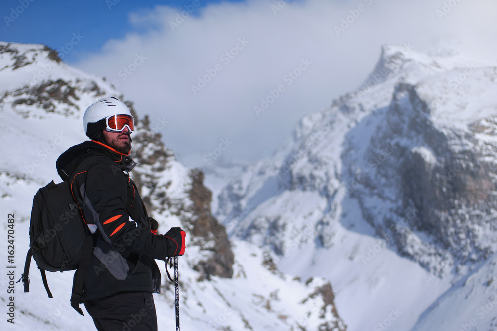 Skiing: male skier in powder snow. Italian Alps, Europe.