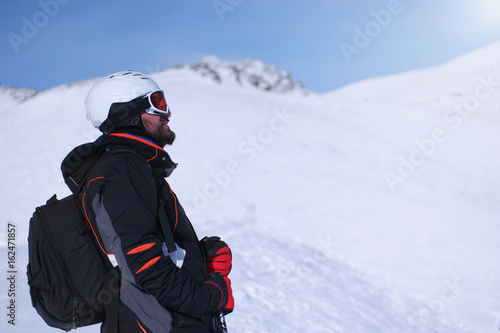 Skiing: male skier in powder snow. Italian Alps, Europe.