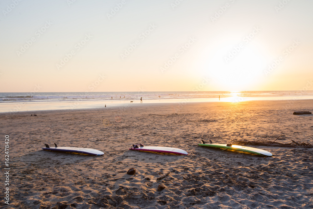 Surfers at Sunset in Santa Teresa, Costa Rica