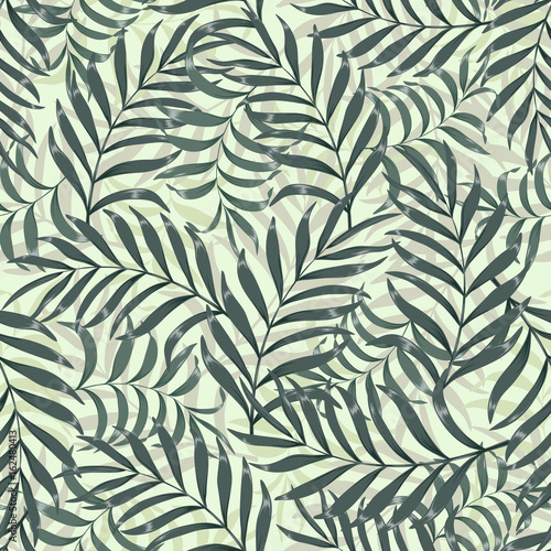 Tropical background with palm leaves. Seamless floral pattern 