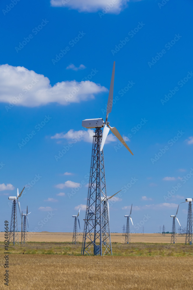 Propellers of windmills / Propellers of windmills on blue sky background, close-up Propellers of windmills / Propellers of windmills on blue sky background, close-up