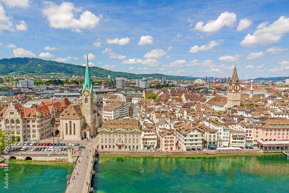 Minster Fraumunster and St. Peter church with city center of Zurich, Switzerland - aerial view