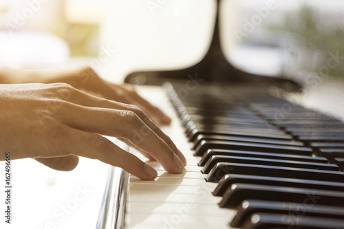 hands of a piano playing guy in a sensitive mood