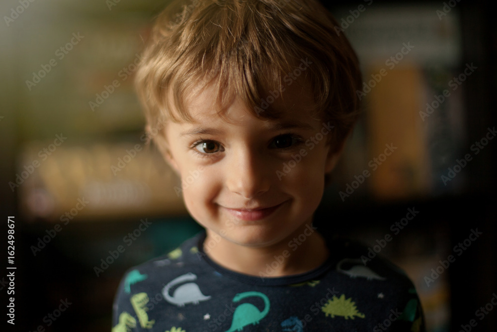 Portrait of a funny child at home