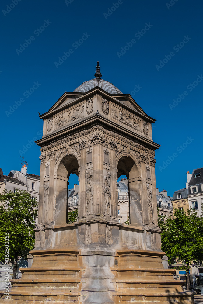  Fountain of the Innocents (Fontaine des Innocents, 1547 - 1550, by architect Pierre Lescot) at place Joachim-du-Bellay. Paris.Fountain of the Innocents is oldest monumental fountain in Paris, France.