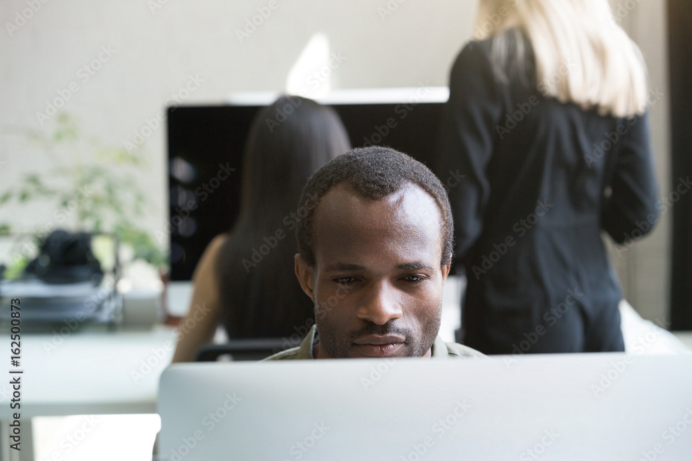Concentrated afro american businessman working Concentrated afro american businessman working