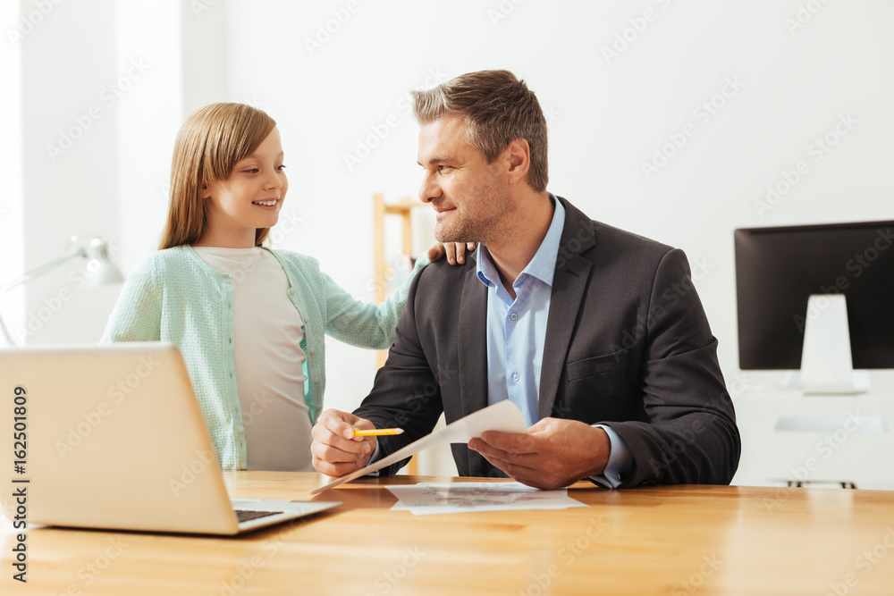 Curious smart child asking dad about his job Curious smart child asking dad about his job