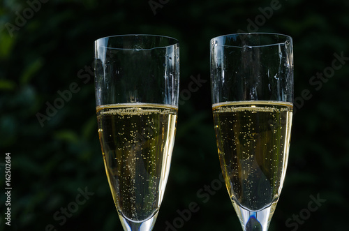 Close up of two glasses with champagne