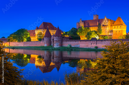 The Castle of the Teutonic Order in Malbork at night, Poland
