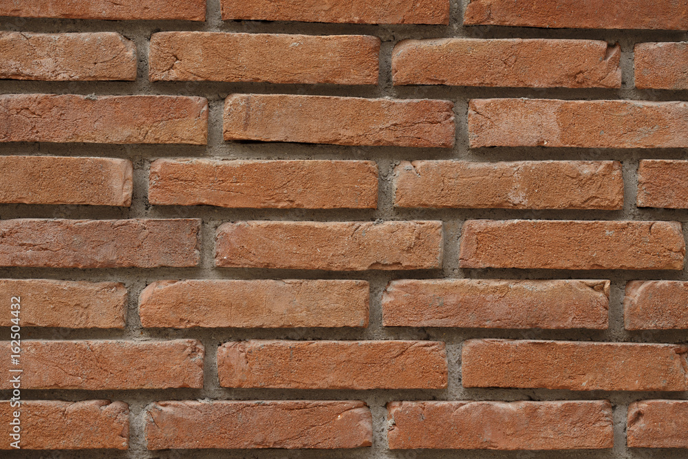Fototapeta premium Brick wall background, Wallpaper made out of bricks, Brick wall texture