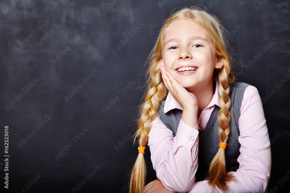 schoolchild on blackboard background schoolchild on blackboard background