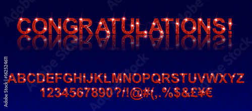 gold alphabets and numbers on dark background.