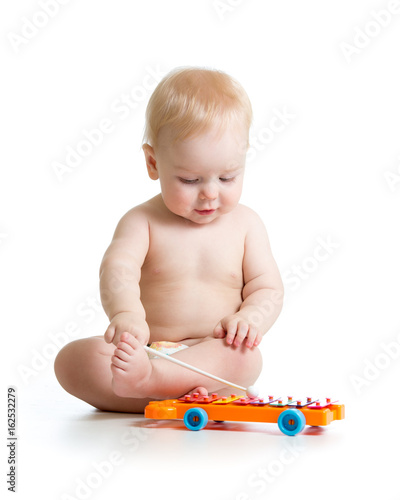cute baby boy playing a xyl...