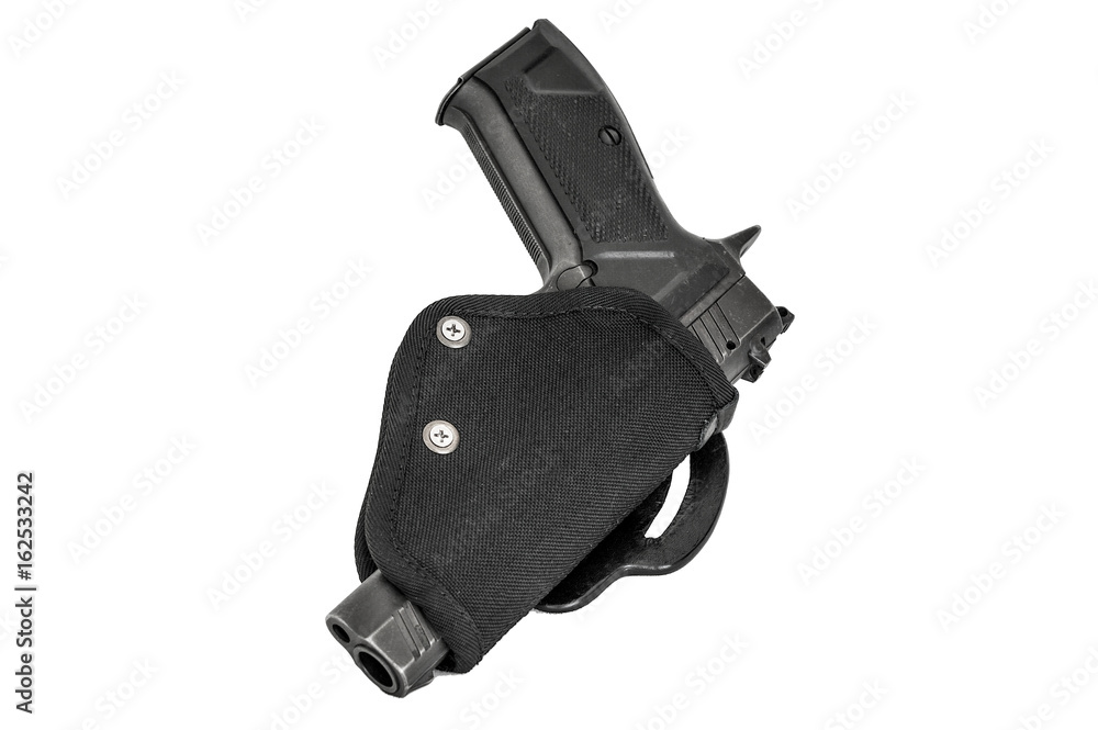 Handgun in the nylon holster. Isolated Handgun in the nylon holster. Isolated