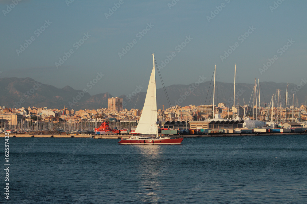 Sea port city and sailing yacht. Palma-de-Majorca, Spain